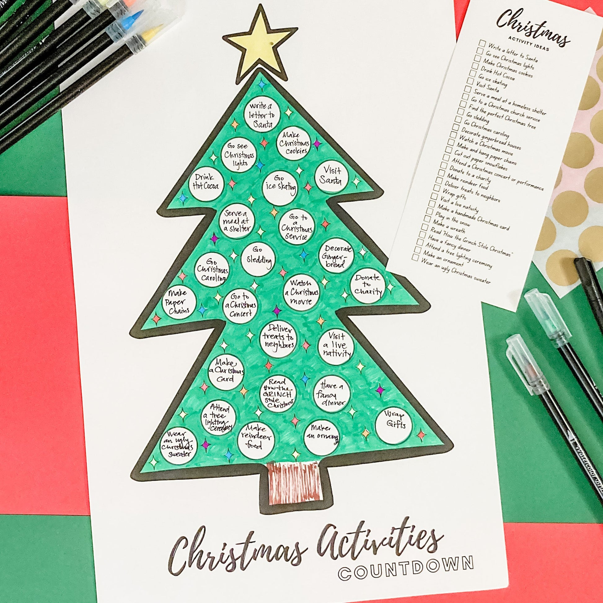 The Advent Scratch-off Christmas tree poster is displayed with activities filled out in the 25 spots.
