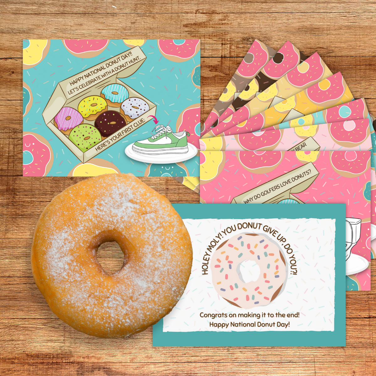 A yeast donut sits next to the full set of cards for the National Donut Day treasure hunt.