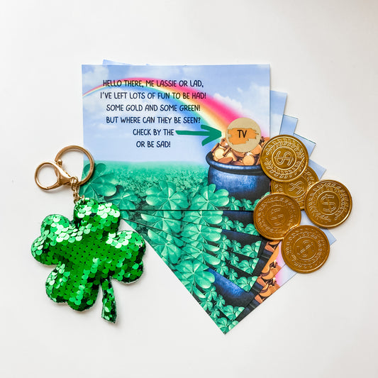 Treasure hunt cards display a rainbow leading to a pot of gold, where a gold scratch-off sticker reveals the location of the treasure hunt's next clue.