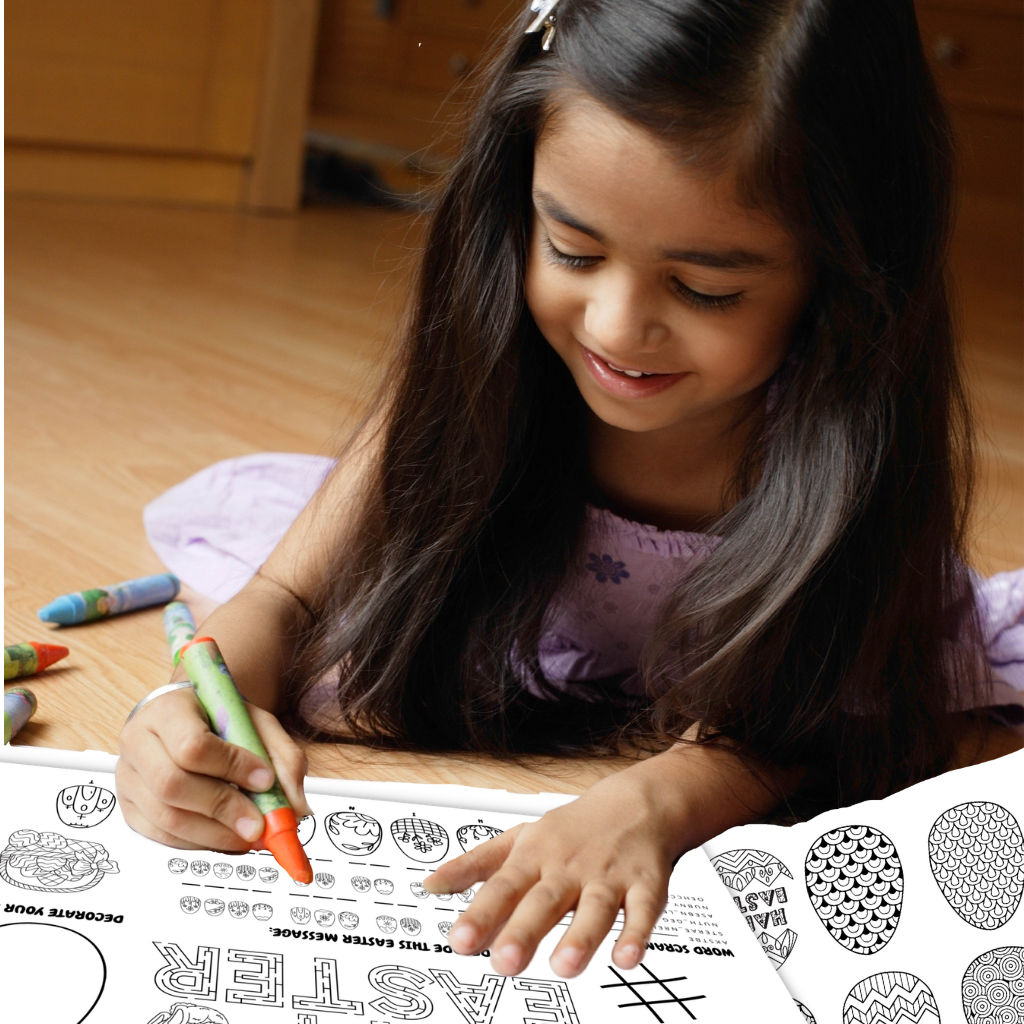 A young girl works on a maze on a coloring and activity page.